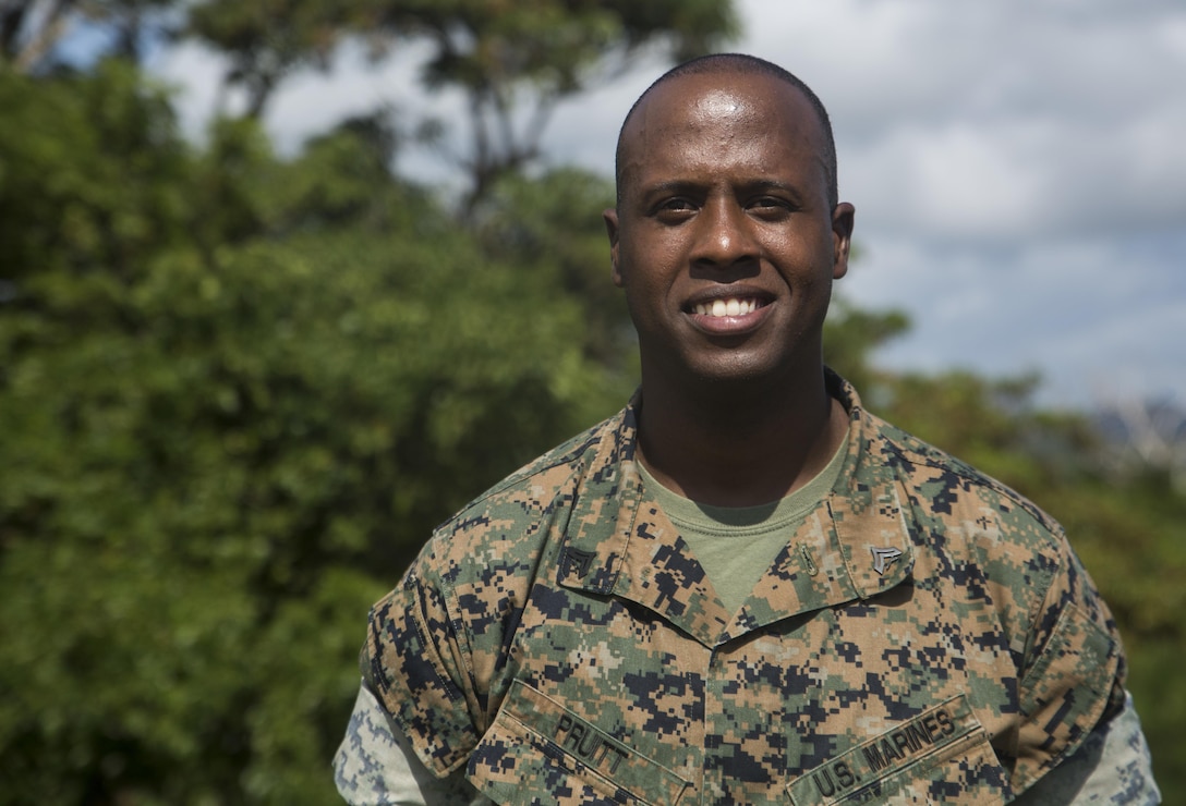 U.S. Marine Corps Cpl. Dejon Pruitt, military policemen with 3rd Law Enforcement Battalion, III Marine Headquarters Group, III Marine Expeditionary Force, explains how he made a difference during his deployment at Okinawa, Japan, Oct. 25, 2016. Marines from III MEF volunteered at the White Cross Children’s Home  in Manila, Philippines, Nov. 2015 - April 2015. (U.S. Marine Corps photo by Lance Cpl. Kelsey Dornfeld)