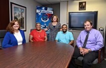 Team members from the AFSC OC-ALC Tinker Small Business Office are, from left, Terri Shook, the procurement center representative from the Small Business Administration; Renaye Tyce; Tracy Nicholson; Richard Scroggins; and Chase Washburn, a Copper Cap intern. (Air Force photo by Kelly White)