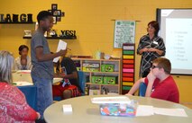 Meegan Mackay leads an exercise with Tinker’s youth during the first annual Life Skills Academy, Sept. 27-28. In this particular exercise, adolescents created self-images which, split in half, portray how they view themselves internally and externally. This included adjectives and feelings, as well as physical features. In bettering confidence, public speaking and communication skills, the teens presented how they view themselves to their peers. (Air Force photo by Jillian Coleman)