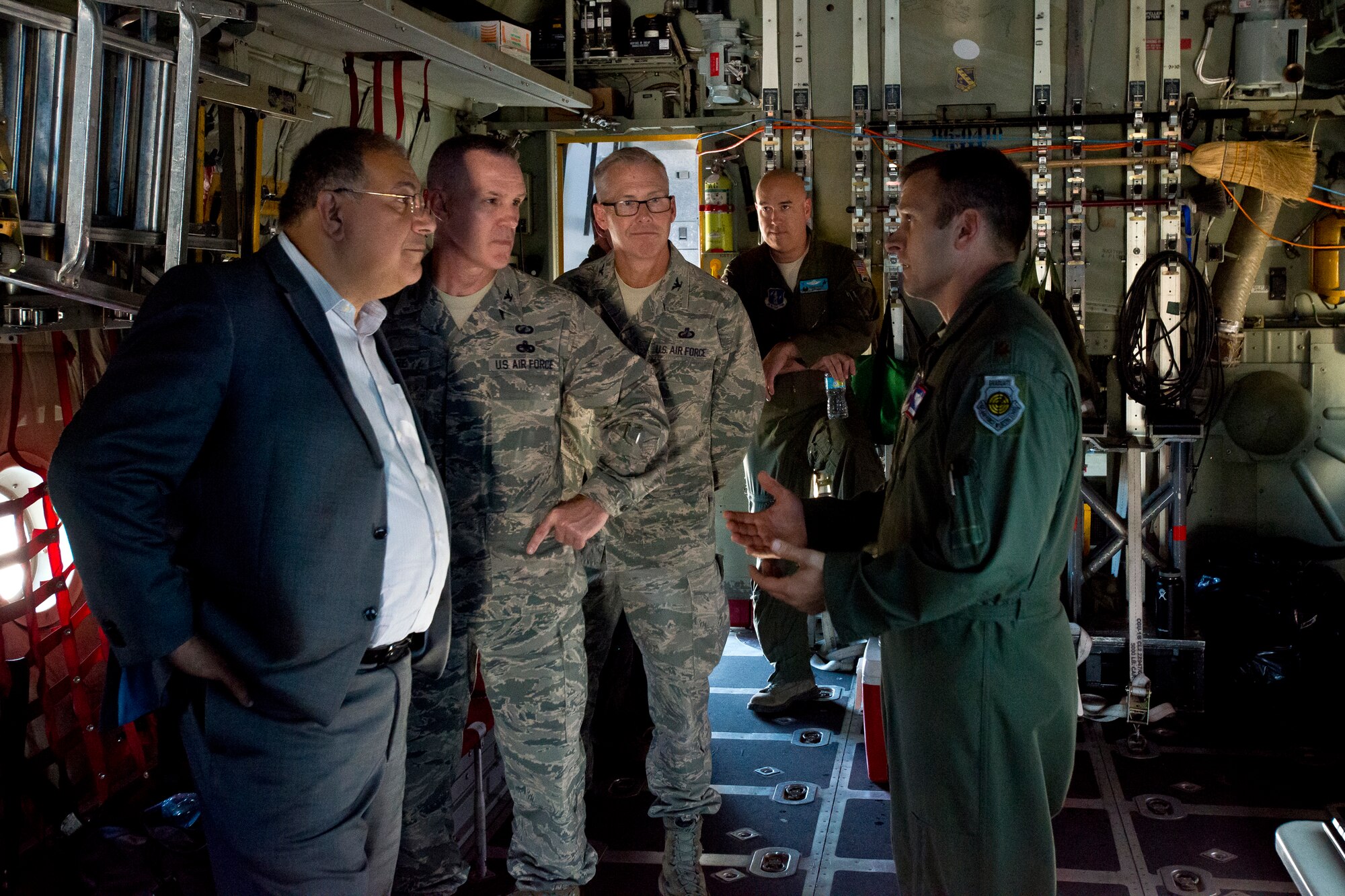 Maj. Justin Brumley, with the Air National Guard Air Force Reserve Command Test Center, informs ANG and AFRC leaders about the progress of various programs in testing for C-130H Hercules aircraft at the ANG AFRC Test Center at Tucson, Arizona, October 20, 2016. The test center is evaluating using the Rolls-Royce T56 Series 3.5 engine across the Guard's legacy C-130H fleet. (U.S. Air National Guard photo by Staff Sgt. John E. Hillier)