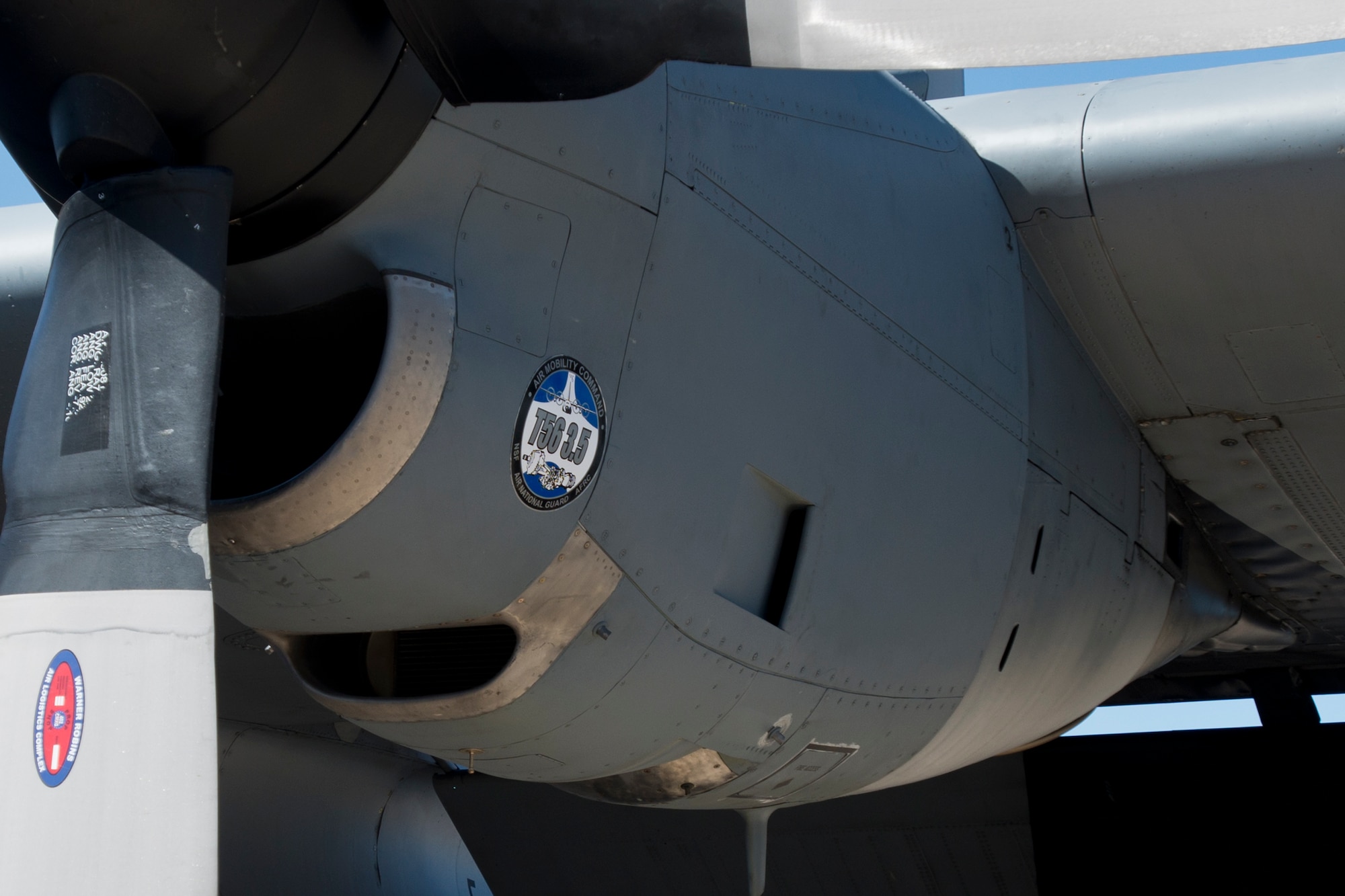 A Rolls-Royce T56 Series 3.5 engine is mounted on a Wyoming Air National Guard C-130H Hercules test aircraft at the Air National Guard Air Force Reserve Command Test Center at Tucson, Arizona, October 20, 2016. The test center is evaluating using the Series 3.5 engines across the Guard's legacy C-130H fleet. (U.S. Air National Guard photo by Staff Sgt. John E. Hillier)