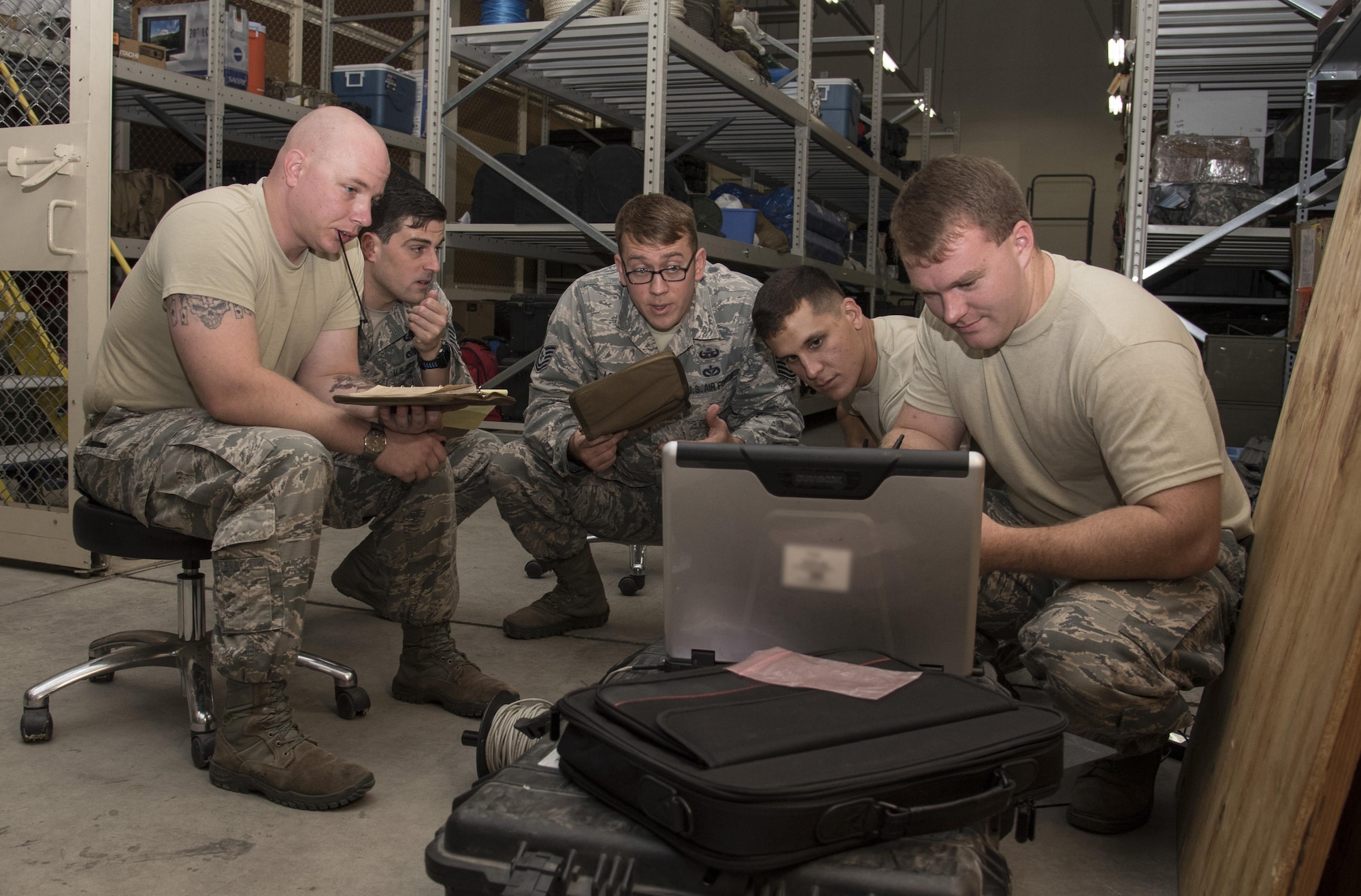 U.S. Air Force Airmen with the 35th Civil Engineer Squadron explosive ordnance disposal flight, study an x-ray system at Misawa Air Base, Japan, Oct. 20, 2016. The system allows members to identify different components contained in a package. Due to the wide variety of IED tactics enemies use, the shop takes each other their mission requirements and dedicates a month of training, honing their skills. (U.S. Air Force photo by Airman 1st Class Sadie Colbert)