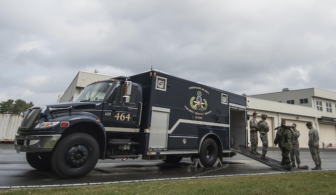 Airmen with the 35th Civil Engineer Squadron explsive ordnance disposal flight receive a briefing on a training scenario at Misawa Air Base, Japan, Oct. 20, 2016. The scenario included a disgruntled worker had access to explosives and attempted to set off a device during a social gathering. The flight is required to complete a minimum of 24 hours of training each week, focusing on each of their mission requirements for a month. (U.S. Air Force photo by Airman 1st Class Sadie Colbert)