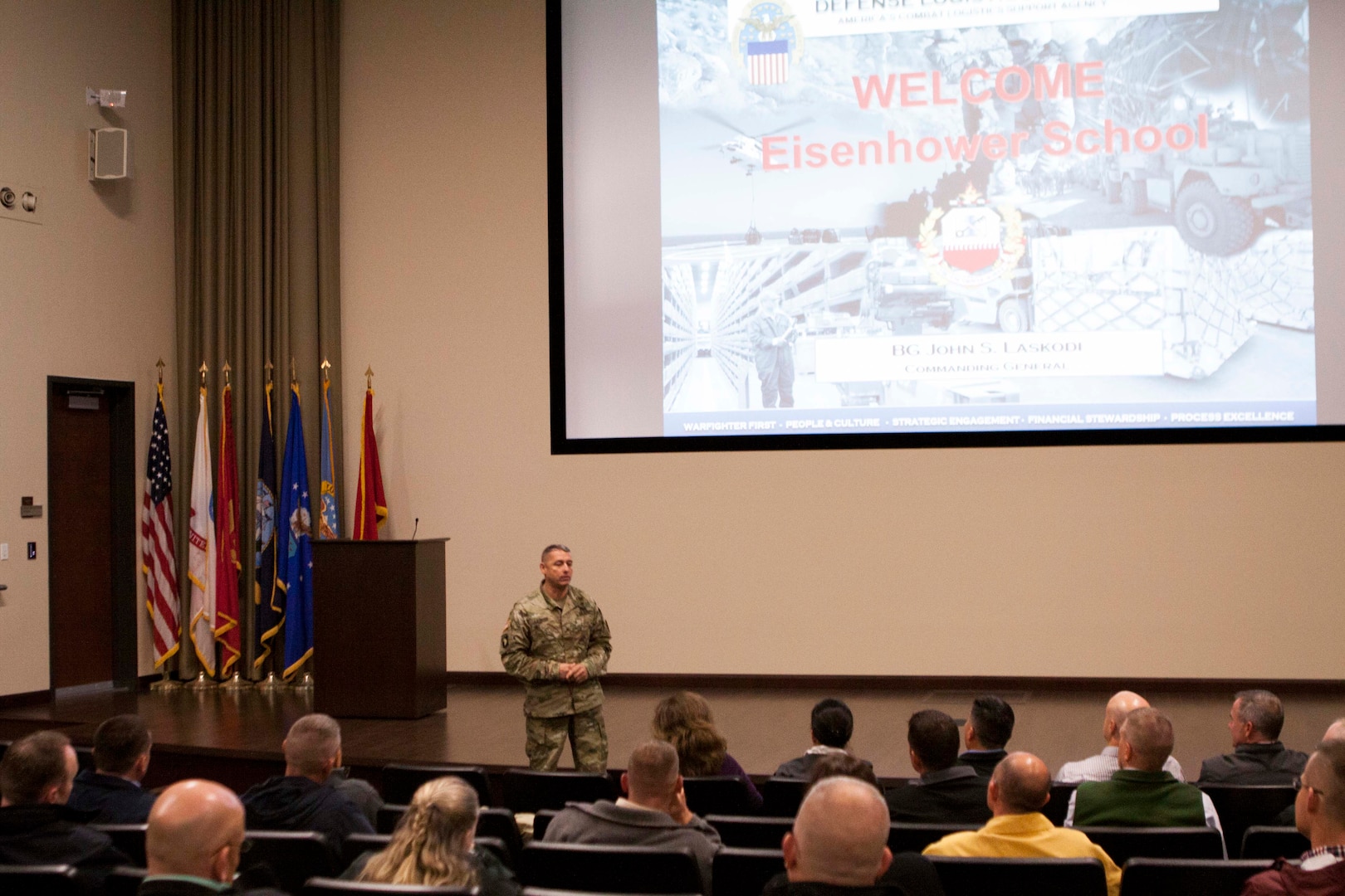 DLA Distribution commanding general Army Brig. Gen. John Laskodi discusses the future of logistics with students from the Dwight D. Eisenhower School for National Security and Resource Strategy.  (Photo by Emily Tsambiras, DLA Distribution Public Affairs)