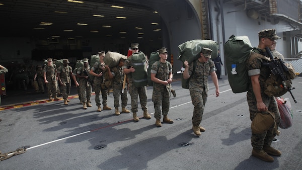 U.S. Marines wait aboard the USS Bonhomme Richard before going ashore after returning from their Fall Patrol of the Asia-Pacific region, Oct. 28, 2016. As the Marine Corps’ only continuously forward deployed unit, the 31st Marine Expeditionary Unit is prepared to respond to a wide range of military operations, from humanitarian assistance missions to limited combat operations, at a moment’s notice. As a balanced air-ground-logistics team, the 31st MEU is ready to respond throughout the Asia-Pacific region.
