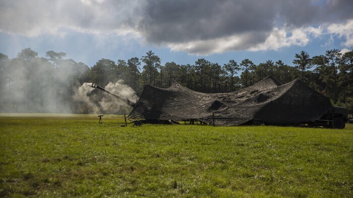 Smoke Clears from a M777 lightweight Howitzer during a Tactical Air Control Party exercise at Camp Lejeune, N.C., Oct. 20, 2016. The Howitzers can mark the location of a target within 200-300 meters with either a white phosphorus or illumination round. 