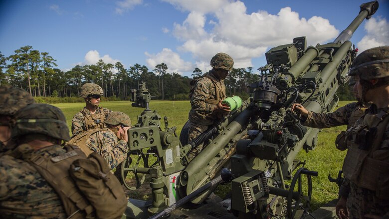 U.S. Marines load a M777 lightweight Howitzer during a Tactical Air Control Party exercise at Camp Lejeune, N.C., Oct. 20, 2016. The purpose behind the exercise was to train Joint Terminal Attack Control Marines for Expeditionary Warfare Training Group Atlantic.