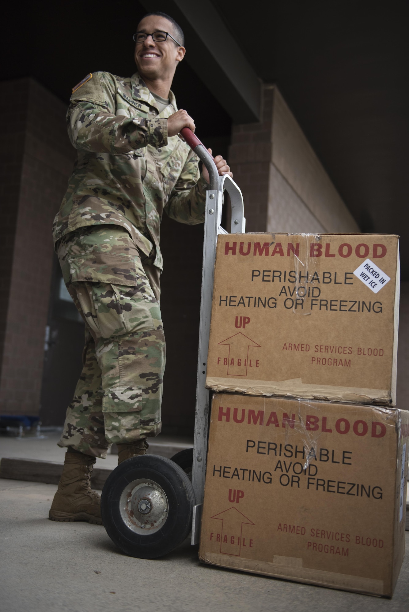 U.S. Army Specialist Shawn Warner, ASWBPL-East laboratory technician, retrieves a shipment of blood at the ASWBPL, Joint Base McGuire-Dix-Lakehurst, N.J., Oct. 21, 2016. The ASWBPL stores between 3500 and 4000 blood products in preparation for both man made and natural disasters.