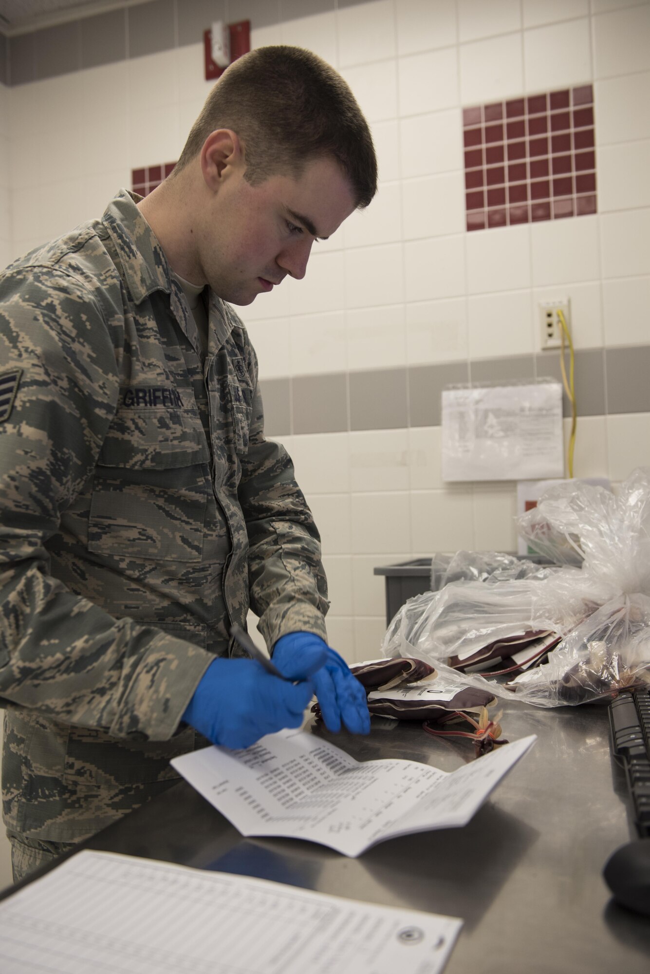 Staff Sgt. Michael Griffith, ASWBPL-East medical laboratory craftsman, processes blood products to be shipped out of the ASWBPL, Joint Base McGuire-Dix-Lakehurst, N.J., Oct 26, 2016. The ASWBPL works alongside mission partners from around the Joint Base to ship life-saving blood to servicemembers in deployed locations. 