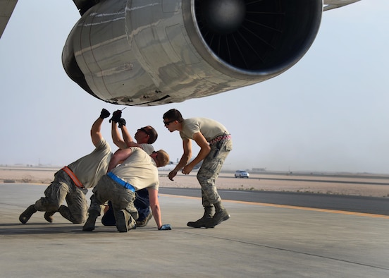 Members of the 379th Expeditionary Aircraft Maintenance Squadron conduct a post-flight systems check on an E-8C Joint Surveillance Target Attack Radar System Oct. 20, 2016, at Al Udeid Air Base, Qatar, following a mission supporting Operation Inherent Resolve. The JSTARS uses its communications and radar systems to support ground attack units and direct air support throughout the area of responsibility. (U.S. Air Force photo/Senior Airman Miles Wilson)