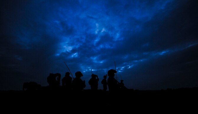 Air Force combat controllers assigned to the 1st Special Operations Squadron, 320th Special Tactics Squadron and South Korea’s 255th Special Operations Squadron, pull security and establish a line of communication on Kunsan Air Base, South Korea, Oct. 22, 2016. Members from 320th STS and 1st SOS worked with the 255th SOS to enhance U.S. and South Korean air force special operations forces' ability to conduct infiltration methods, jump clearing team operations, airfield establishment, aircraft control and close air support familiarization. (U.S. Air Force photo/Senior Airman Colville McFee)