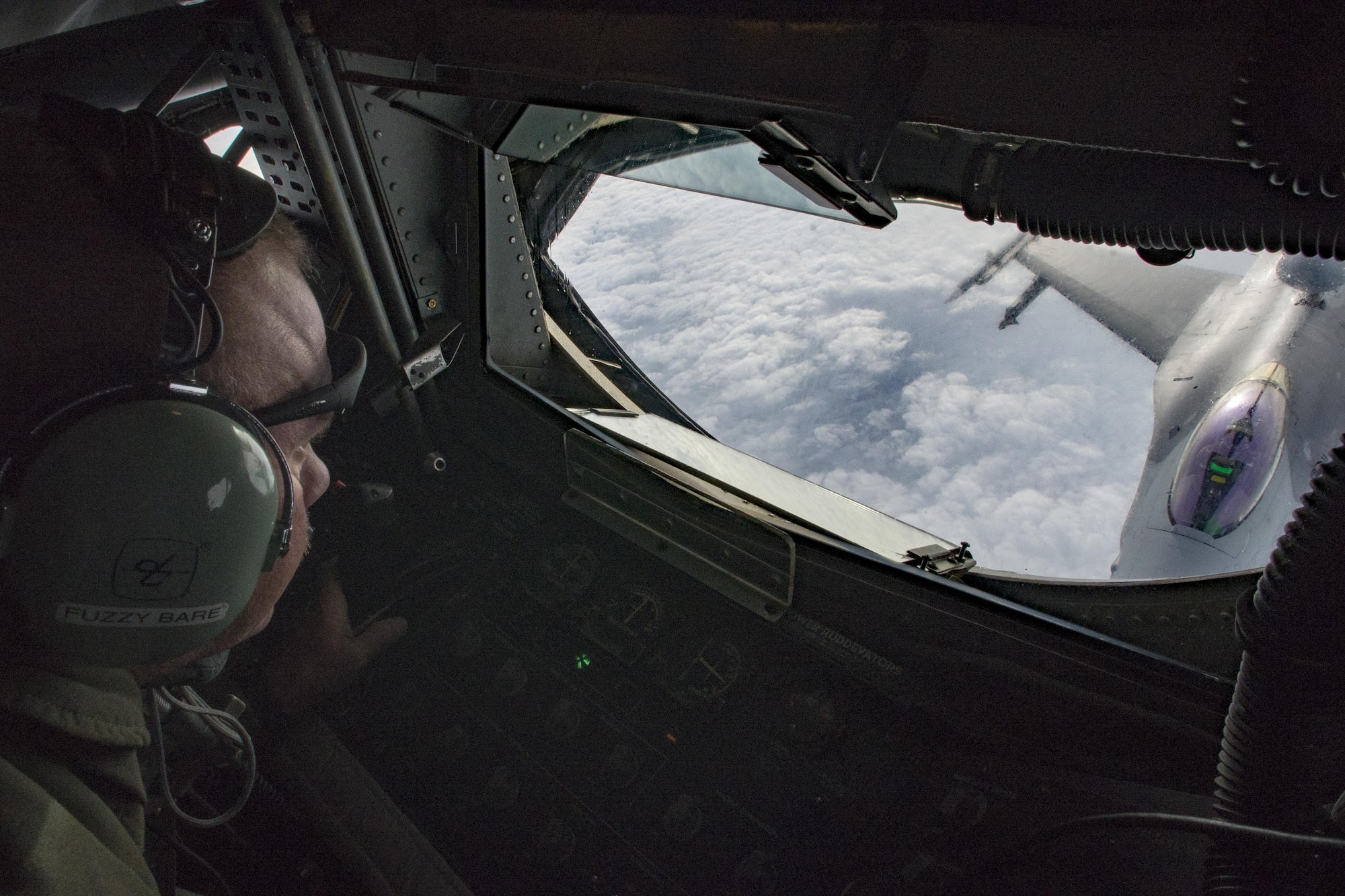 Senior Master Sgt. Brian Jensen, Utah Air National Guard’s 191st Air Refueling Squadron boom operator, refuels an Aviano F-16 Fighting Falcon during a two-week training on Oct. 26, 2016. Jensen used the tube-like boom to transfer fuel from the KC-135 Stratotanker to more than twelve F-16s each day. (U.S. Air Force photo by Airman 1st Class Cory W. Bush/Released)