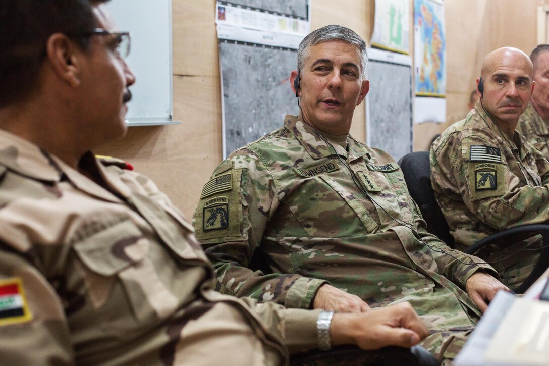 U.S. Army Lt. Gen. Steven Townsend, Commander of Combined Joint Task Force – Operation Inherent Resolve, discusses battle plans with Iraqi security forces at Qayyarah West, Iraq, Oct. 25, 2016. More than 60 coalition partners have committed themselves to the goals of eliminating the threat posed by the Islamic State of Iraq and the Levant and have contributed in various capacities to the effort to combat ISIL in Iraq, the region and beyond.  (U.S. Army photo by Spc. Christopher Brecht)