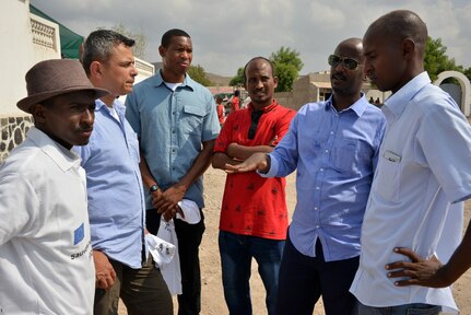 Tadjoura, Djibouti – Reserve Soldiers with C/Co 411th Civil Affairs Battalion discuss the impact of language discussion groups with Hassan Dabale, the Obock Region Prefect, during an eradication of female genital mutilation conference here on October 26, 2016.  Civil Affairs teams are supporting the host nation government’s goal of enhancing their language capacity skills by conducting English Discussion Groups throughout the country.
(US Army Photo By Staff Sgt. Gregory Williams C/Co 411th Civil Affairs Battalion)