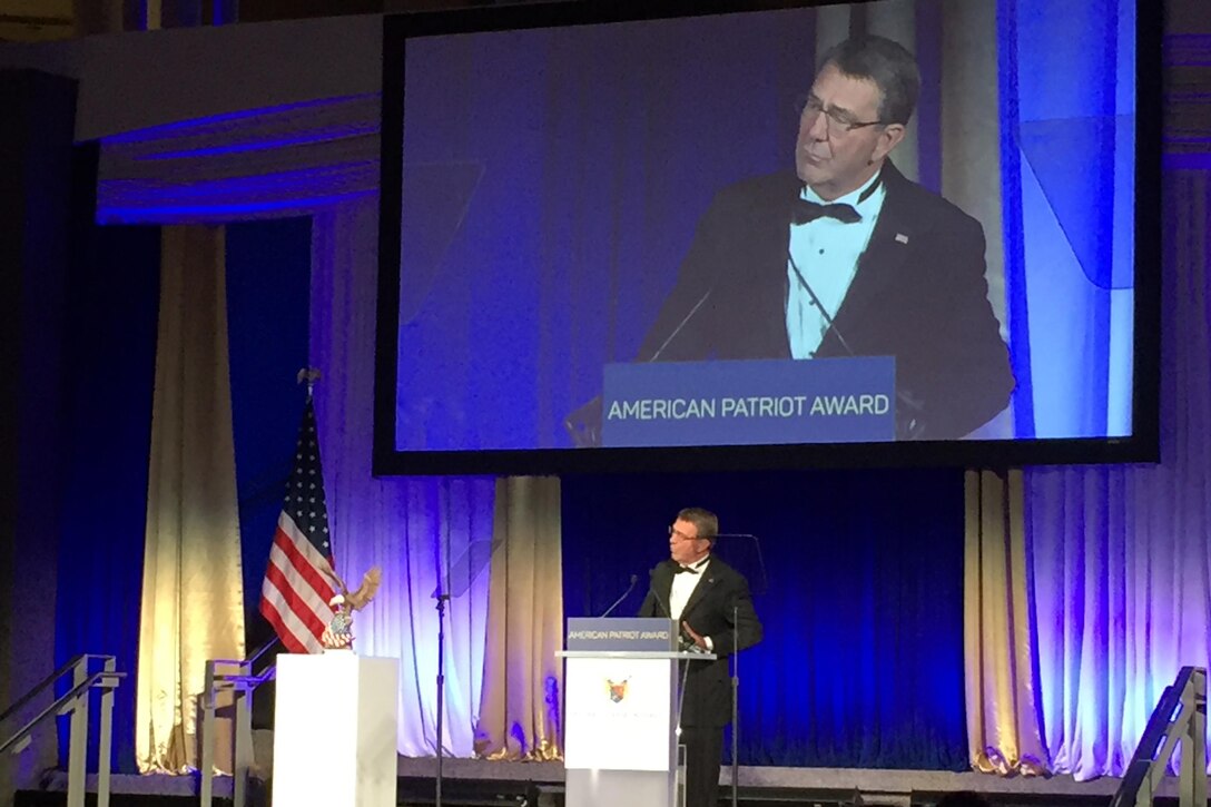Defense Secretary Ash Carter thanks the National Defense University Foundation for recognizing the men and women of the Defense Department with the Patriot Award during a ceremony at the Reagan Building in Washington, D.C.,  Oct. 27, 2016. DoD photo by Jim Garamone