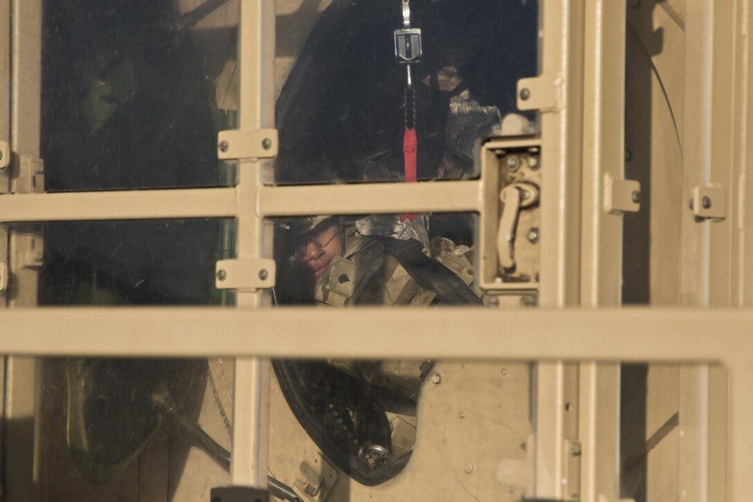 Soldiers of the 316th Sustainment Command (Expeditionary) egress from a humvee egress assistance trainer (HEAT) at Fort Hood, Tx., Oct. 26, 2016. (U.S. Army photo by Staff Sgt. Dalton Smith)