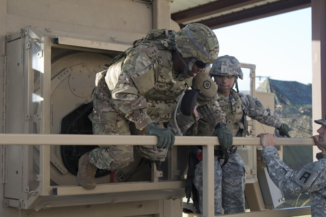 Soldiers of the 316th Sustainment Command (Expeditionary) egress from a humvee egress assistance trainer (HEAT) at Fort Hood, Tx., Oct. 26, 2016. (U.S. Army photo by Staff Sgt. Dalton Smith)