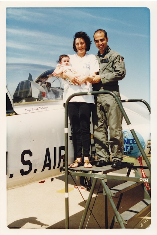 Parents, Anna Domenici and Vincenzo Repici, hold Giorgia Repici, now an Airman 1st Class in the U.S. Air Force, during red carpet day at Vance Air Force Base, Oklahoma, where her father went through pilot training. (Courtesy photo)
