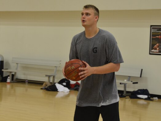 1st Lt. Chase Krammerer, Air Force Research Lab Munitions Directorate, prepares to shoot during the All-Air Force men's basketball team try outs Oct. 18 Joint Base San Antonio-Lackland, Texas.  Krammerer made the squad who will play in the all-service tournament Oct. 31- Nov. 8.