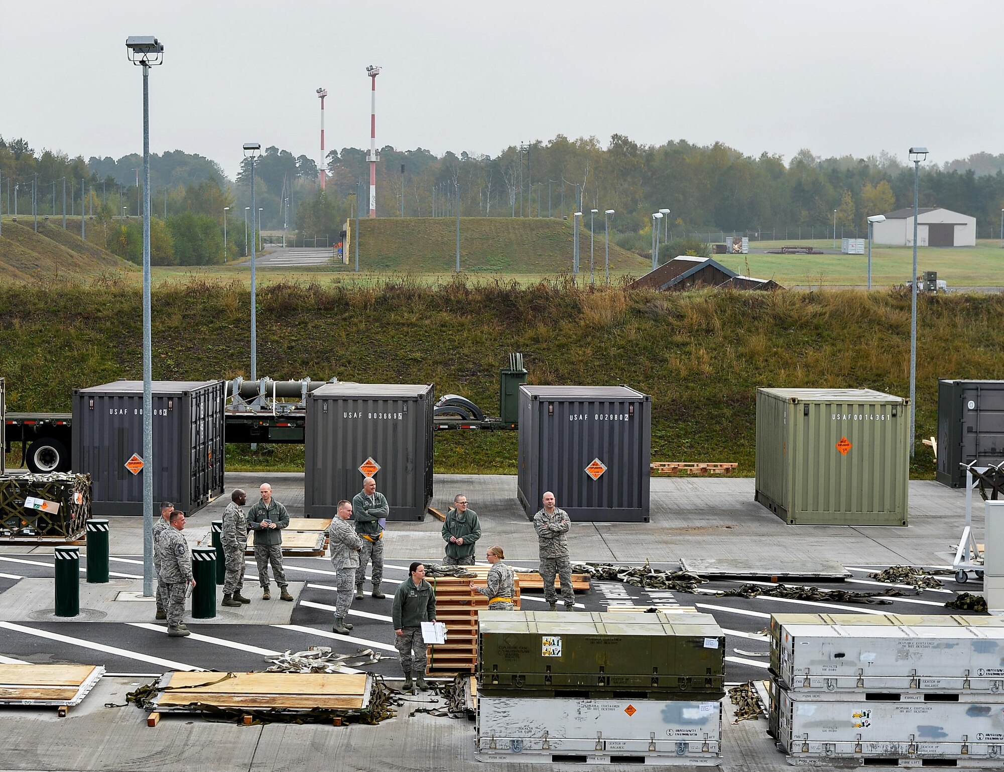 Ramstein Air Base officials gather to observe the 86th Munitions Squadron’s local exercise Oct. 26, 2016. Airmen at the 86th MUNS conducted the exercise to enhance their readiness for real-world missions. (U.S. Air Force photo by Airman 1st Class Joshua Magbanua)