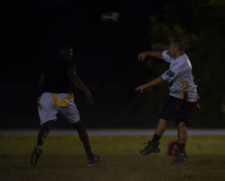 Jerod Weddle, 2nd Maintenance Squadron football team quarterback, airs it out for the endzone at Barksdale Air Force Base, La., Oct. 25, 2016. The 2nd MXS beat 2nd Logistics Readiness Squadron 33-0. (U.S. Air Force photo/Airman 1st Class Stuart Bright)