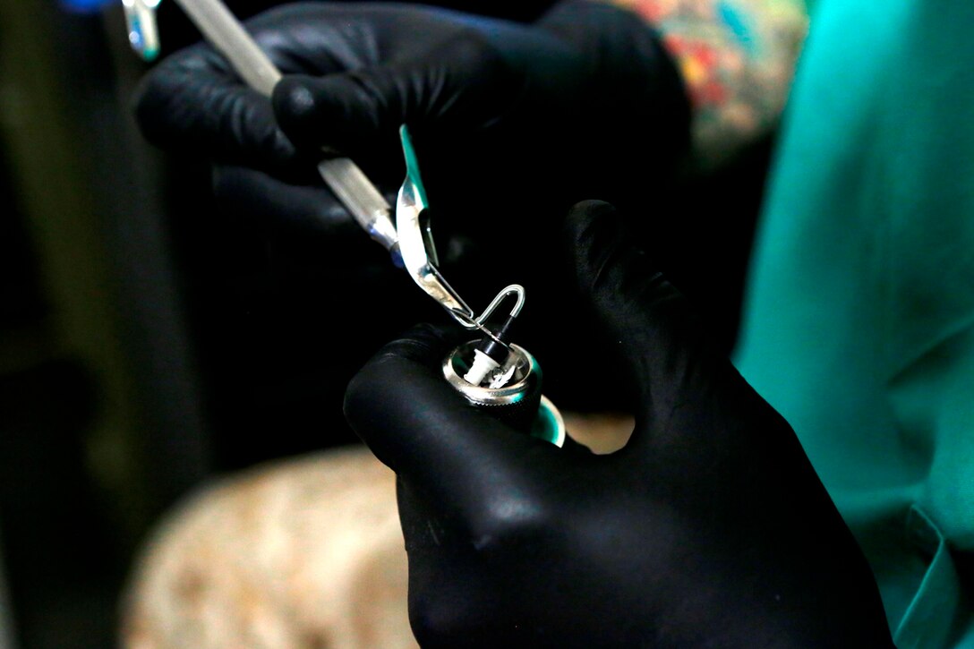 U.S. Navy Seaman James Pytel prepares a dental filling during the Authorized Dental Allowance List Exercise on Camp Pendleton, Calif., from October 24-28, 2016. The dental restorative material is used to restore the function, integrity and morphology of a missing tooth structure. ADALEX is being conducted to ensure that Sailors are able to maintain the ability to provide dental care in a deployed environment. Pytel is a dental hygienist with 1st Dental Battalion, 1st Marine Logistics Group. (U.S. Marine Corps photo by Lance Cpl. Jocelyn Ontiveros)