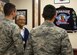 Retired Col. Charles E. McGee, a Tuskegee Airman, speaks with Airmen during a visit to Hanscom Air Force Base, Mass., Oct. 27, 2016. Senior Airman Alfredo Maldonado, right, and Airman 1st Class Quinton Coke, both personnelist with the 66th Force Support Squadron, and other Airmen from Hanscom, met with McGee. (U.S. Air Force photo/Mark Herlihy)