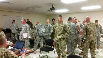 Army Reserve Soldiers assigned to 2nd Battalion, 364th Regiment, 189th Infantry Brigade, First Army Division West, stand in line during Soldier Readiness Processing for their unit members ahead of an upcoming mobilization, Oct. 21, 2016.
The SRP was conducted along with a pre-mobilization Family Readiness Day event for family members of the mobilizing Soldiers. Ms. Elayne Evans, Family Readiness Support Assistant, 85th Support Command, assisted the unit at Joint Base Lewis-McChord, Washington, with Family Programs resources to prepare the family members during the mobilization next year.
(Photo by Ms. Elayne Evans)