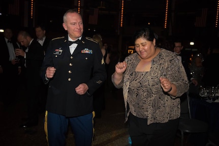 Army Reserve Sgt. David Lietz, 85th Support Command, dances with his guest during the USO of Illinois-hosted 75th Anniversary of the USO Star-Spangled Salute Gala, Oct. 22, 2016, in Chicago. Lietz attended with service members from all throughout the Chicago land area and the country to include Congressional Medal of Honor recipients: retired Army Capt. Florent "Flo" Groberg, and retired Marine 1st Lt. Harvey C. "Barney" Barnum, Jr.
(Photo by Rick Sanchez)