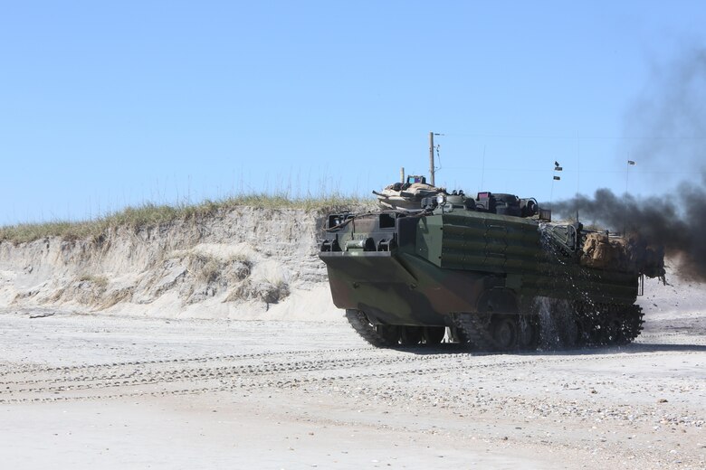 An amphibious assault vehicle moves toward the water during a Marine Corps Combat Readiness Evaluation at Camp Lejeune, N.C., Oct. 24, 2016. Marines with 3rd Battalion, 8th Marine Regiment worked together with different elements throughout the Marine Air-Ground Task Force in preparation for an upcoming deployment. (U.S. Marine Corps photo by Sgt. Clemente C. Garcia)