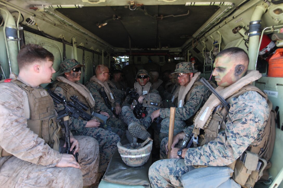 Marines from 3rd Battalion, 8th Marine Regiment load into an amphibious assault vehicle during a Marine Corps Combat Readiness Evaluation on Onslow Beach at Camp Lejeune, N.C., Oct. 24, 2016. The unit underwent the training to enhance their warfighting and crisis response capabilities before an upcoming deployment.  (U.S. Marine Corps photo by Sgt. Clemente C. Garcia)