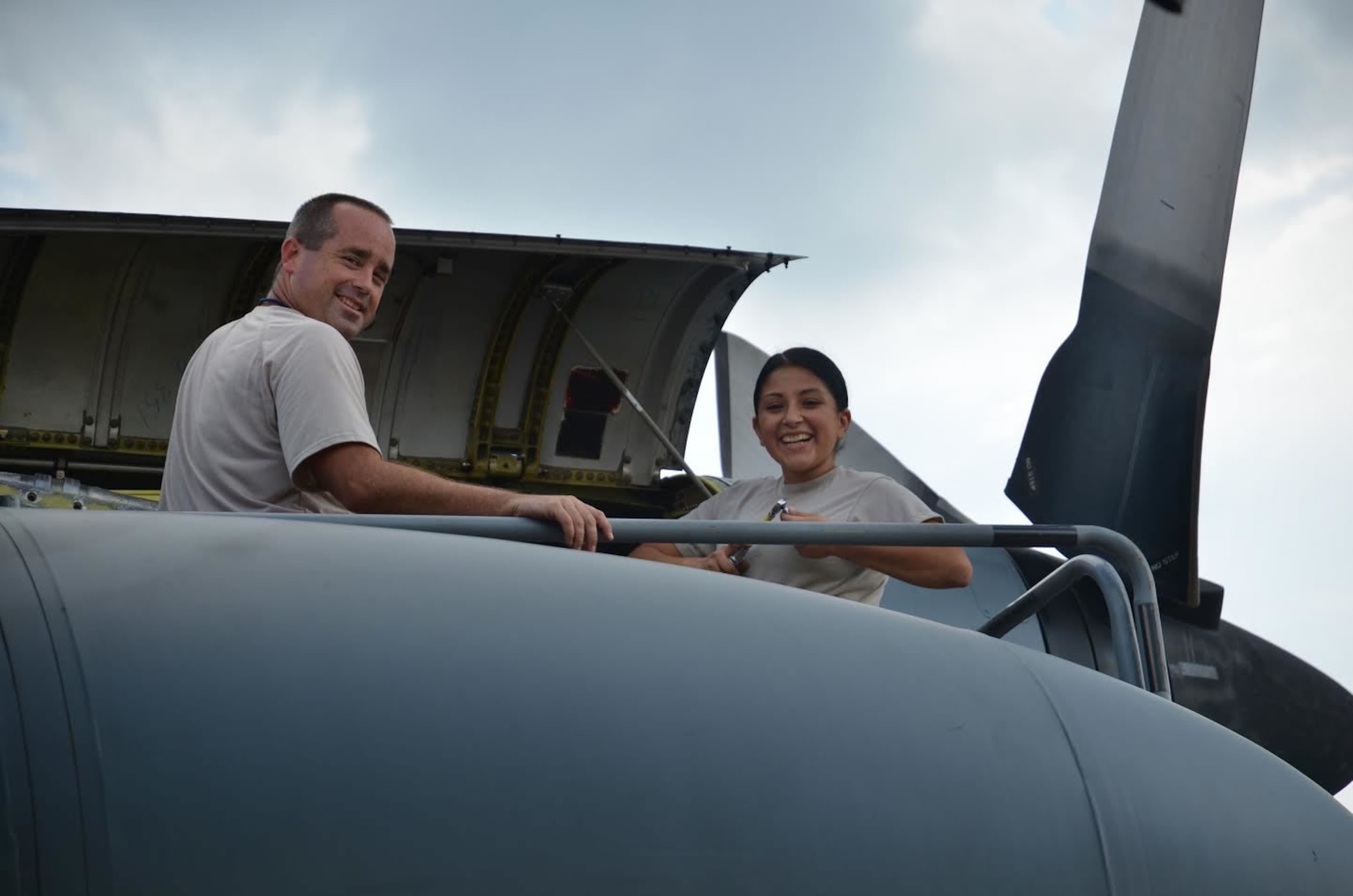 Airman 1st Class Cindy Esquero, 94th Maintenance Squadron avionics guidance and controls, replaces a tachometer generator under the guidance of Technical Sgt. John Halliday, 94th MXS at Dobbins Air Reserve Base on September 27, 2016. Esquero is on seasonal orders to learn to maintain the various parts of the C-130. (U.S. Air Force photo by Senior Airman Lauren Douglas) 