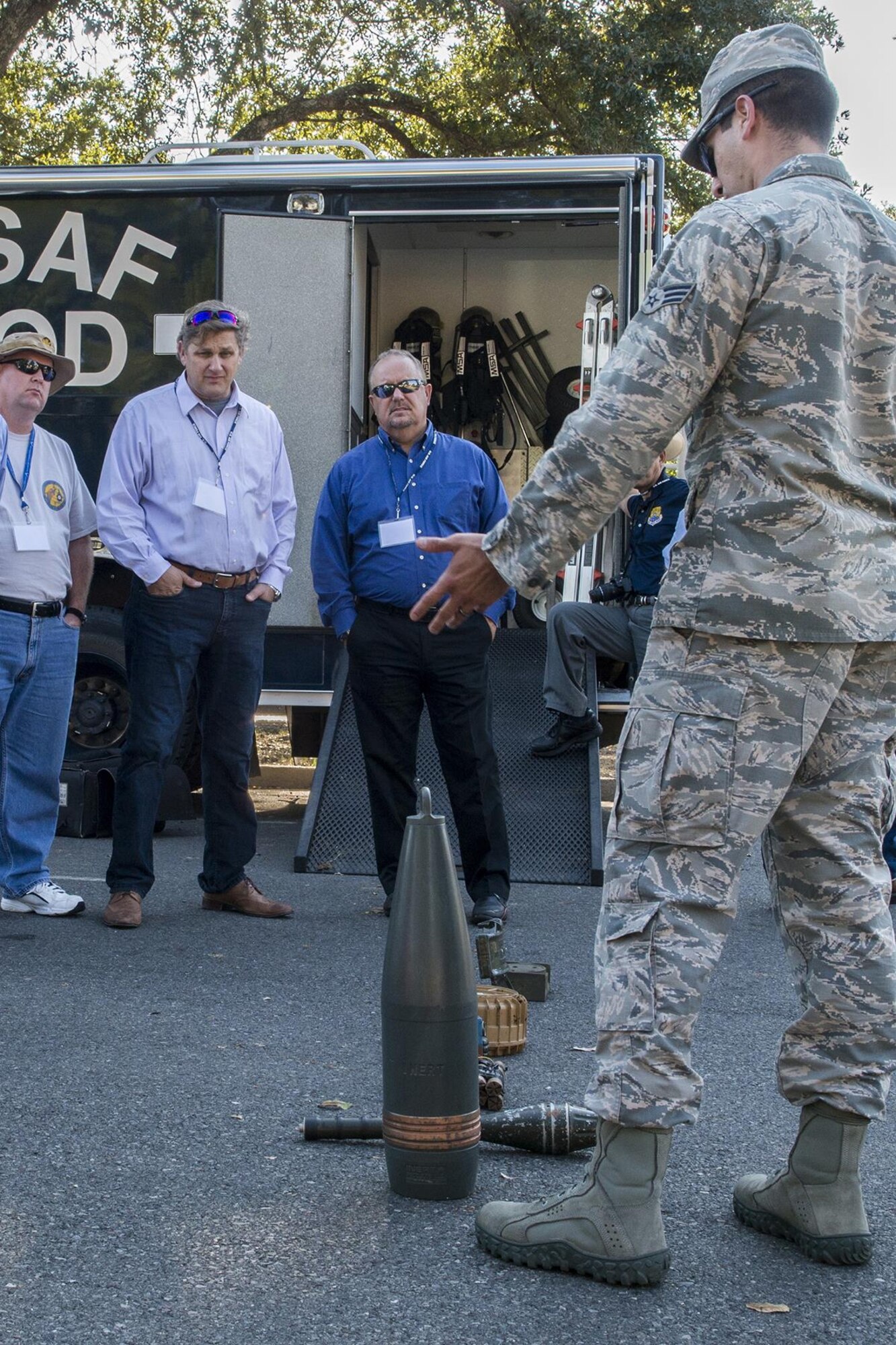 A group of civic leaders get a briefing by an 2nd Bomb Wing Explosive Ordnance Disposal team member during a tour at Barksdale Air Force Base, La., Oct. 27, 2016. The tour was hosted by the 433rd Airlift Wing from Lackland Air Force Base, Texas, and travel to Barksdale to get first hand look at the different missions throughout the Air Force Reserve Command. (U.S. Air Force photo by Master Sgt. Greg Steele/Released)