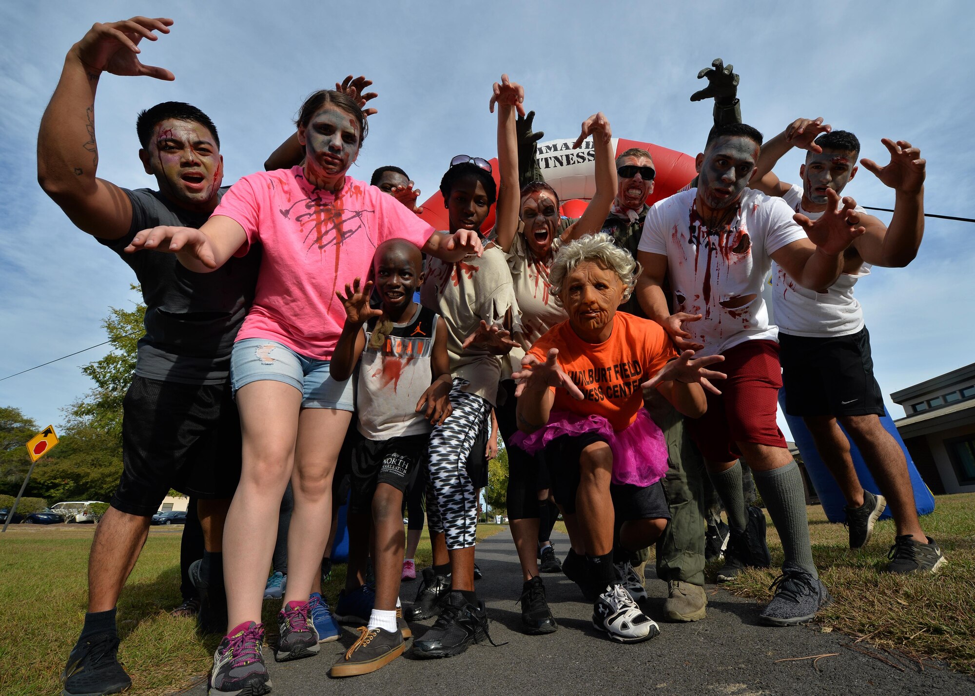 Zombie Air Commandos form up prior to running the Fear the Running Dead Race at Hurlburt Field, Fla., Oct. 27, 2016. The 1st Special Operations Force Support staff coordinates monthly fitness events around base. This month’s event appeals to Airmen’s “spooky side” with a Halloween-themed race. (U.S. Air Force photo by Senior Airman Andrea Posey)