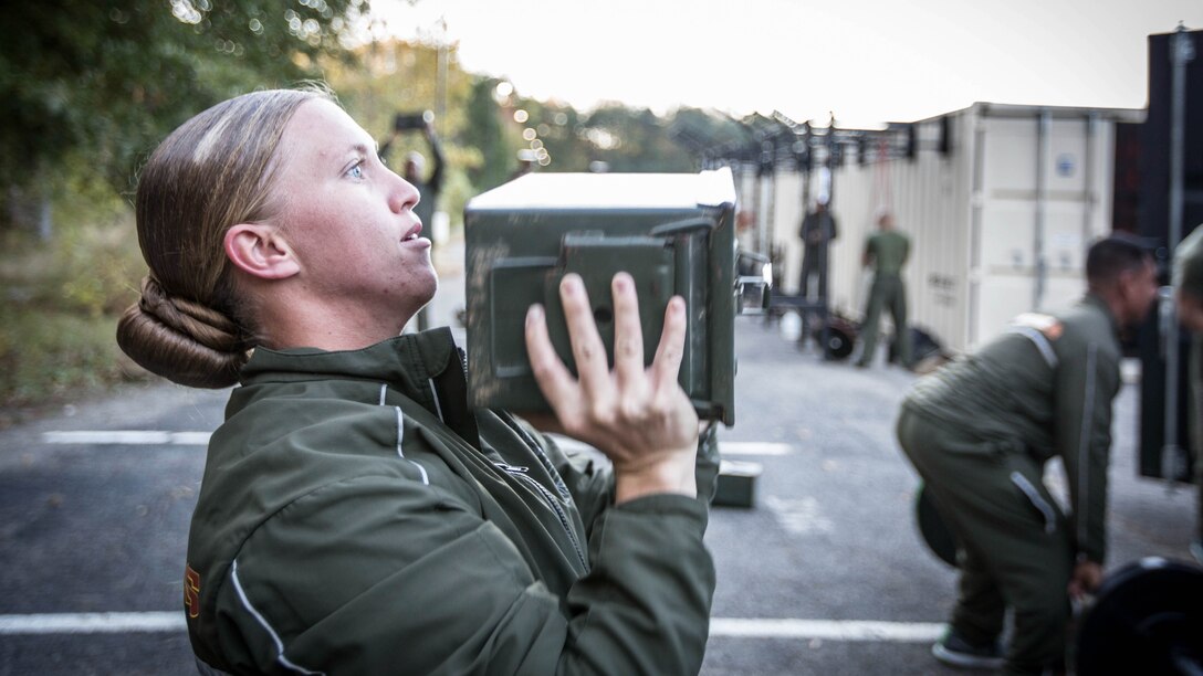 A Force Fitness Instructor (FFI) student executes proper ammo can lift technique as part of the practical application portion of the course at Marine Corps Base Quantico, Virginia, October 25, 2016. The FFI course is made up of physical training, classroom instruction and practical application to provide the students with a holistic approach to fitness. Upon completion, the Marines will serve as unit FFIs, capable of designing individual and unit-level holistic fitness programs.