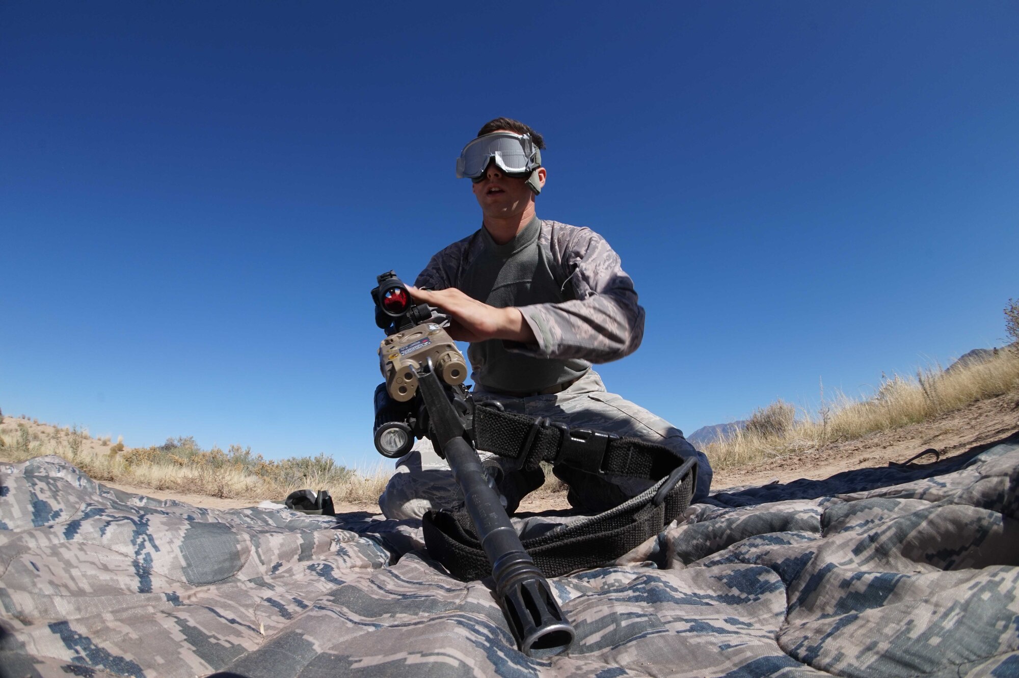 Staff Sgt. Antonio Pacheco competes in a skills test at the first-ever Manzano Challenge Oct. 22 at  Kirtland. The event saw 64 Airmen from Security Forces competing in different stations, ranging from weapons skills and land navigation to team tactics and problem solving. 