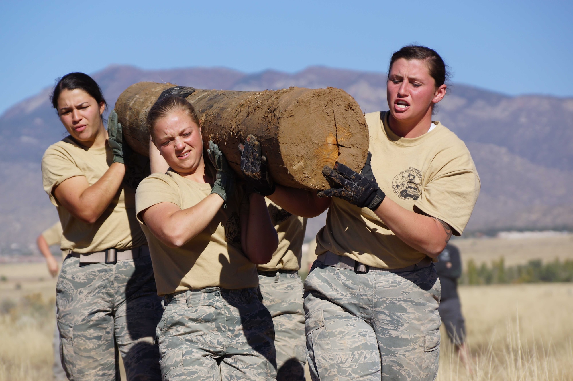 Airman 1st Class Alejandra Serna, Senior Airman Nevada Dobbs and Airman Olivia McIntosh competes in a skills test at the first-ever Manzano Challenge Oct. 22 at  Kirtland. The event saw 64 Airmen from the 377th Security Forces Group competing in different stations, ranging from weapons skills and land navigation to team tactics and problem solving. 