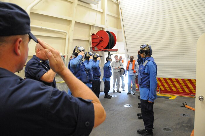 U.S. Coast Guard Capt. Scott Clendenin, U.S. Coast Guard cutter Hamilton (WMSL 753) commander, welcomes Jocelerme Privert, President of the Republic of Haiti and Peter Mulrean, U.S. Ambassador to Haiti, onboard the Hamilton off the coast of Jeremie, Haiti, Oct. 8, 2016. (U.S. Coast Guard Photo by Petty Officer First-Class Joseph Cook)