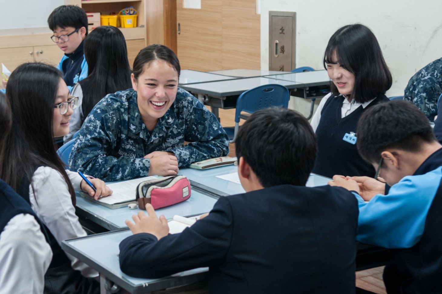 BUSAN, Republic of Korea (Oct. 19, 2016) - Petty Officer 3rd Class (AW) Risa Nielsen, from Oxnard, California, assigned to the Navy’s only forward-deployed aircraft carrier, USS Ronald Reagan (CVN 76), participates in a cultural exchange with students during a community relations event at Daecheon Middle School. Ronald Reagan is on patrol with Carrier Strike Group 5 supporting security and stability in the Indo-Asia-Pacific region.