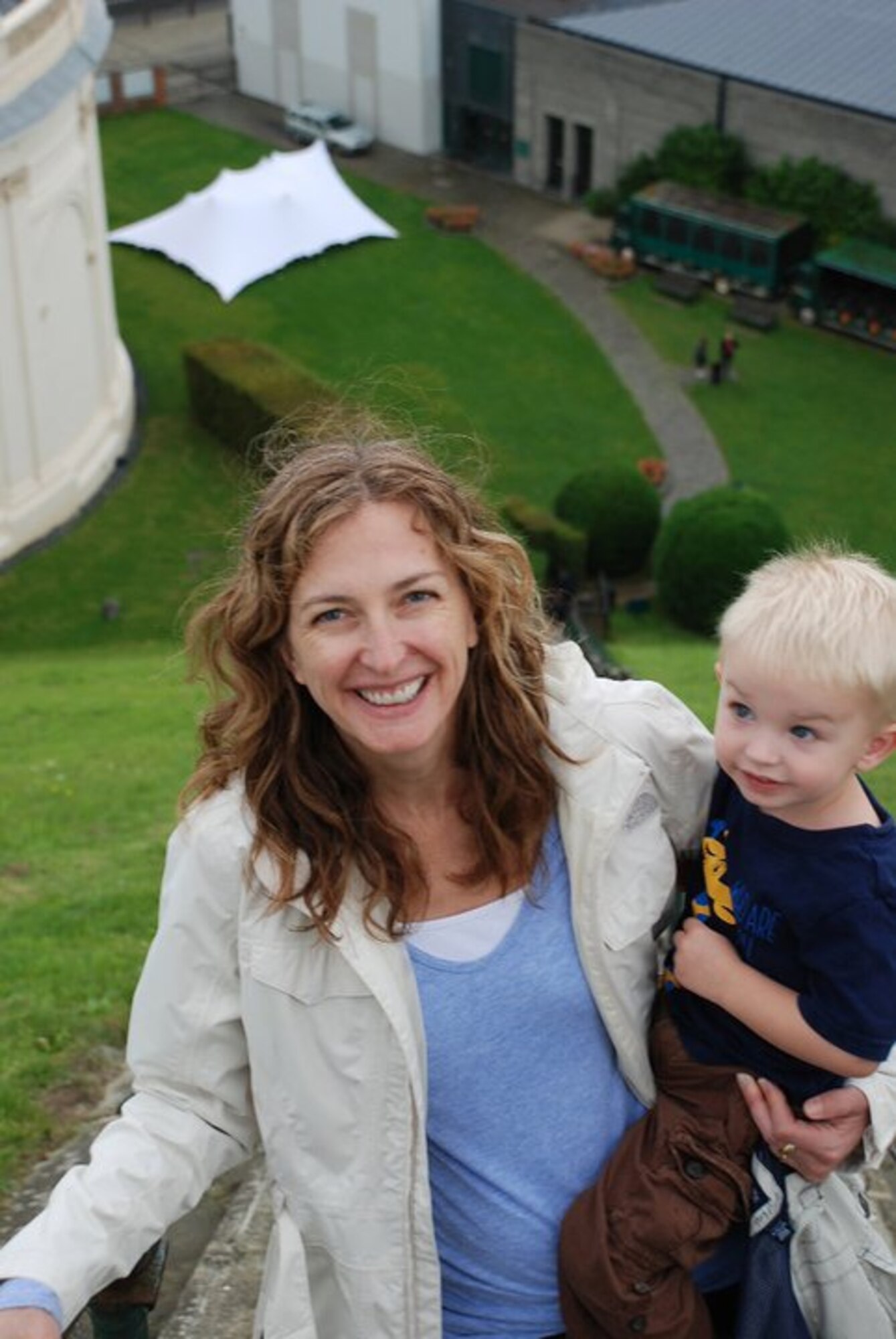 Leta Matte climbs stairs with her child to the Lion’s Mound, Aug. 21, 2011, in Braine-I’Alleud, Belgium. Matte and her family spent two years in Belgium for her husband’s work. This photo was taken five years before Matte was diagnosed with breast cancer. (Courtesy photo)