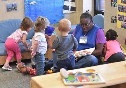 Patricia Bonneau, education technician, interacts with the children during play time at the Joint Base Charleston Child Development Center, Oct. 24, 2016. The CDC provides daytime care for children of Department of Defense members from six months to five years of age.