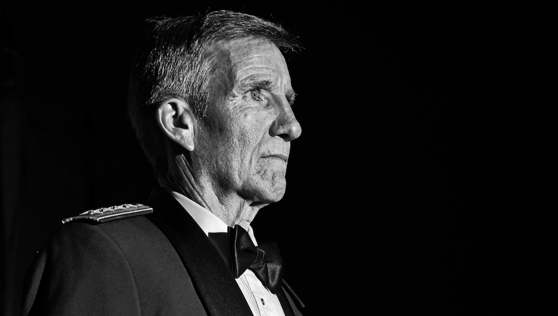 Gen. Hawk Carlisle, commander of Air Combat Command, stands at attention during the opening of his Order of the Sword presentation ceremony at the Hampton Roads Convention Center in Hampton, Va., Oct. 27, 2016. Military branches around the world present prestigious swords of honor to recognize the accomplishments and service to their country and fellow man. In the Air Force, the Order of the Sword remains the highest and only honor presented by the noncommissioned officer corps to a senior ranking officer and is maintained by the command chief master sergeant of the designated command. (U.S. Air Force photo by Staff Sgt. Nick Wilson)