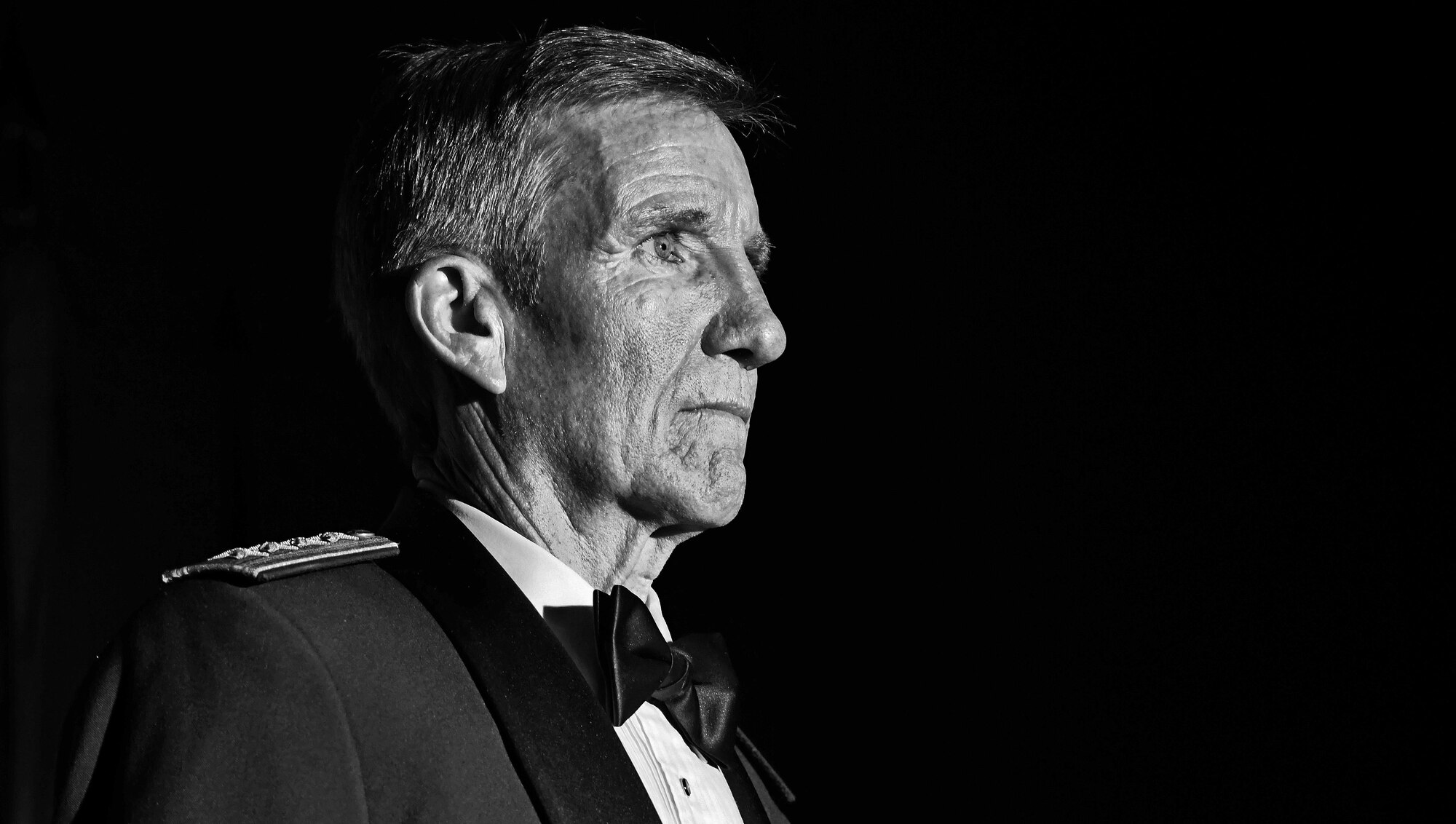 Gen. Hawk Carlisle, commander of Air Combat Command, stands at attention during the opening of his Order of the Sword presentation ceremony at the Hampton Roads Convention Center in Hampton, Va., Oct. 27, 2016. Military branches around the world present prestigious swords of honor to recognize the accomplishments and service to their country and fellow man. In the Air Force, the Order of the Sword remains the highest and only honor presented by the noncommissioned officer corps to a senior ranking officer and is maintained by the command chief master sergeant of the designated command. (U.S. Air Force photo by Staff Sgt. Nick Wilson)