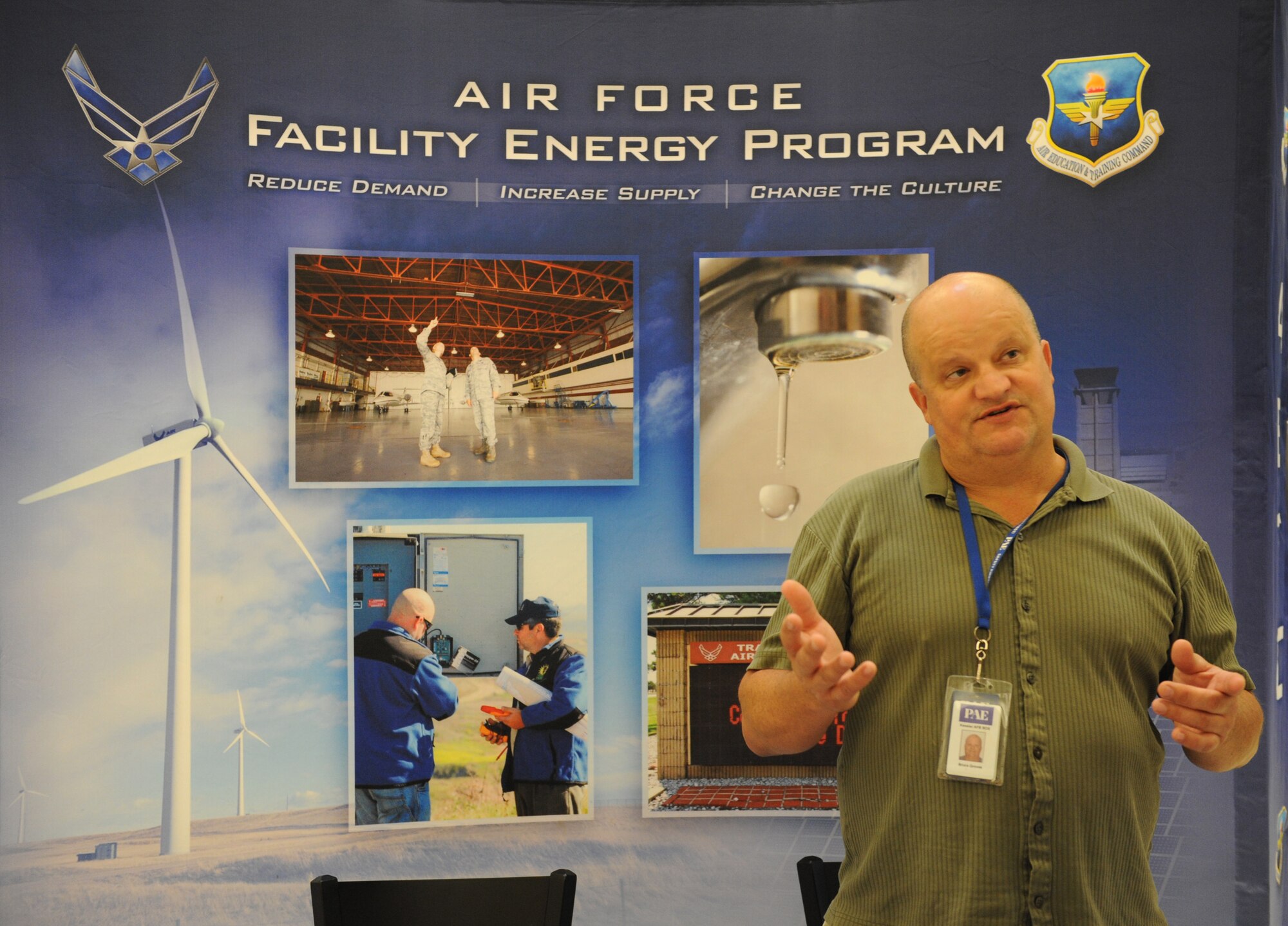 Bruce Groves, Base Operations Support installation energy manager, promotes Energy Action Month to Keesler personnel at the base exchange Oct. 28, 2016, on Keesler Air Force Base, Miss. The goals of Energy Action Month are to increase awareness about energy consumption and to encourage energy-saving actions in Airmen, civilians and their families.  (U.S. Air Force photo by Kemberly Groue/Released)