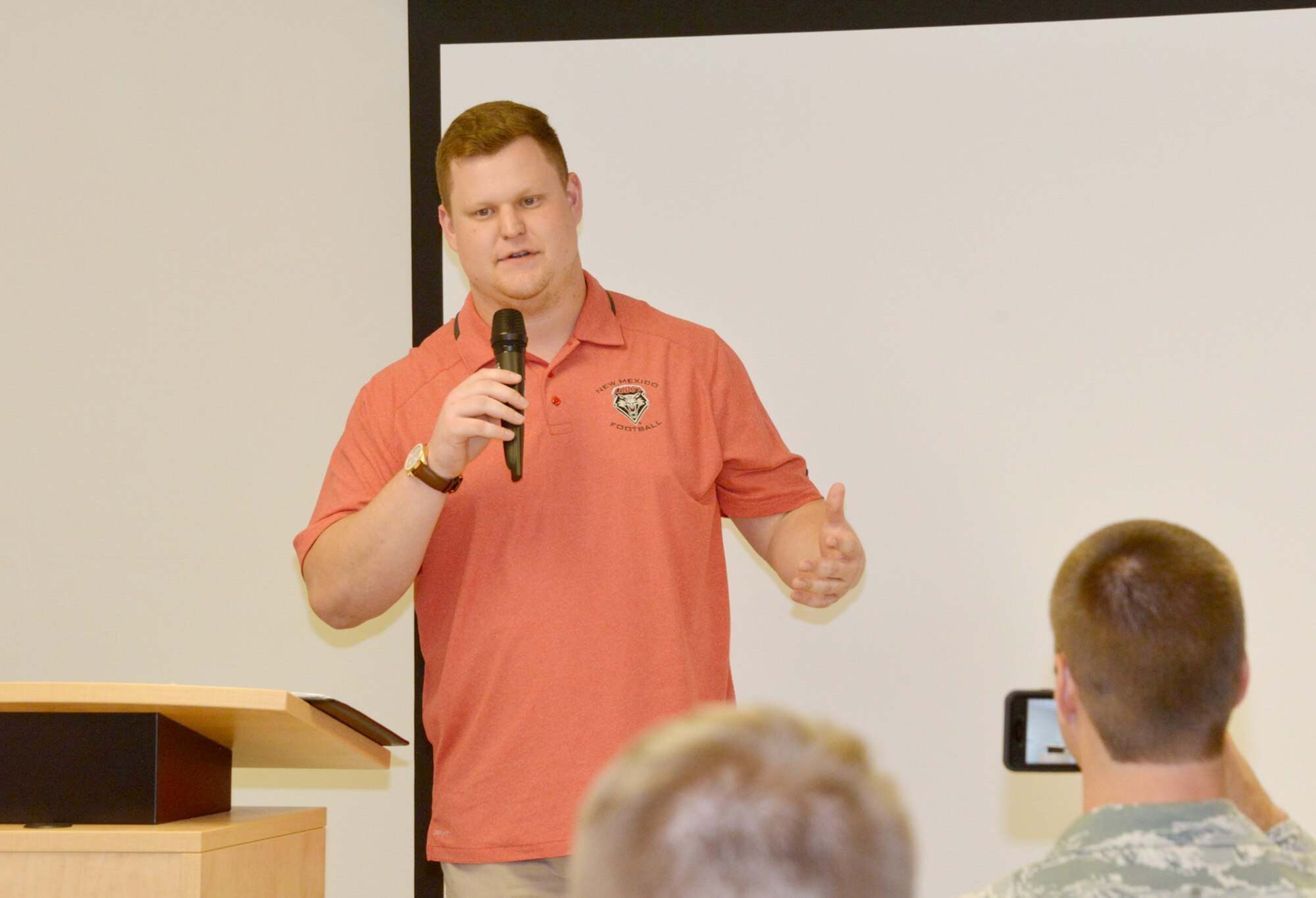 Former UNM football player Garrett Adcock speaks to a group of Airmen Oct. 20 at the Gravity Airmen's Ministry Center.