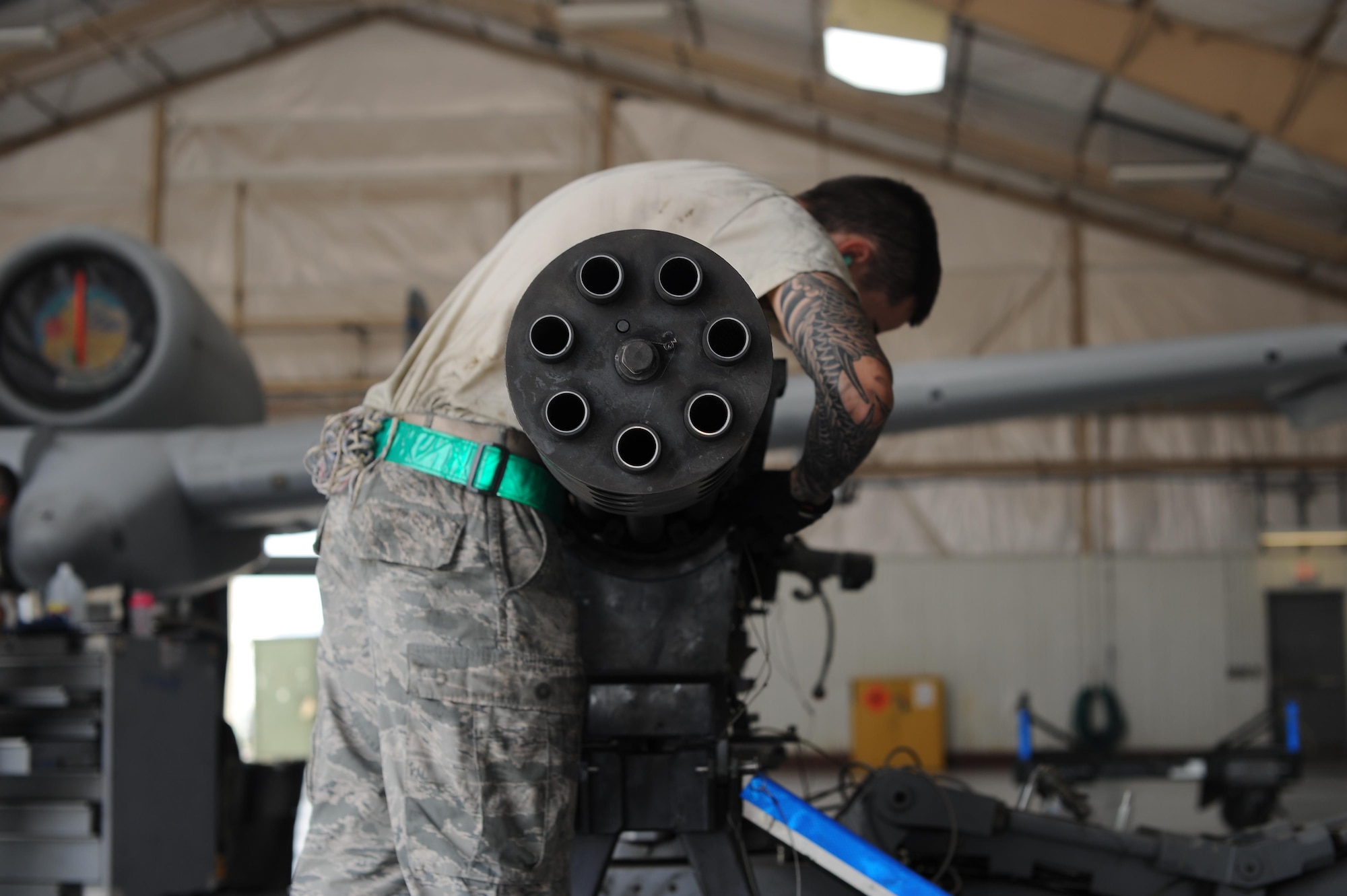 U.S. Air Force Airman 1st Class Michael Sherwood, 355th Aircraft Maintenance Squadron load crew member, ensures that a GAU-8/A Gatling gun is securely fastened before being transported to maintenance at Davis-Monthan Air Force Base, Ariz., Oct. 24, 2016. Once the Gatling gun is removed from the A-10C Thunderbolt II, it is transported to the armament shop to be disassembled, cleaned, inspected and reassembled. (U.S. Air Force photo by Airman 1st Class Ashley N. Steffen)   