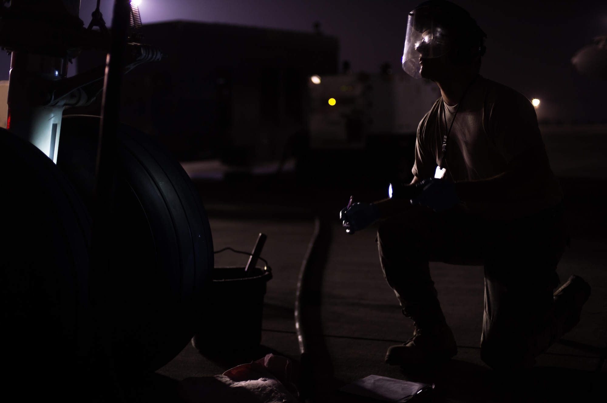 Airman 1st Class Richard, a KC-10 Extender fuel systems specialist, completes a fuels system inspection at an undisclosed location in Southwest Asia, Oct. 26, 2016. The KC-10s are providing refueling support to several coalition airframes working to liberate the city of Mosul, Iraq. (U.S. Air Force photo by Senior Airman Tyler Woodward)