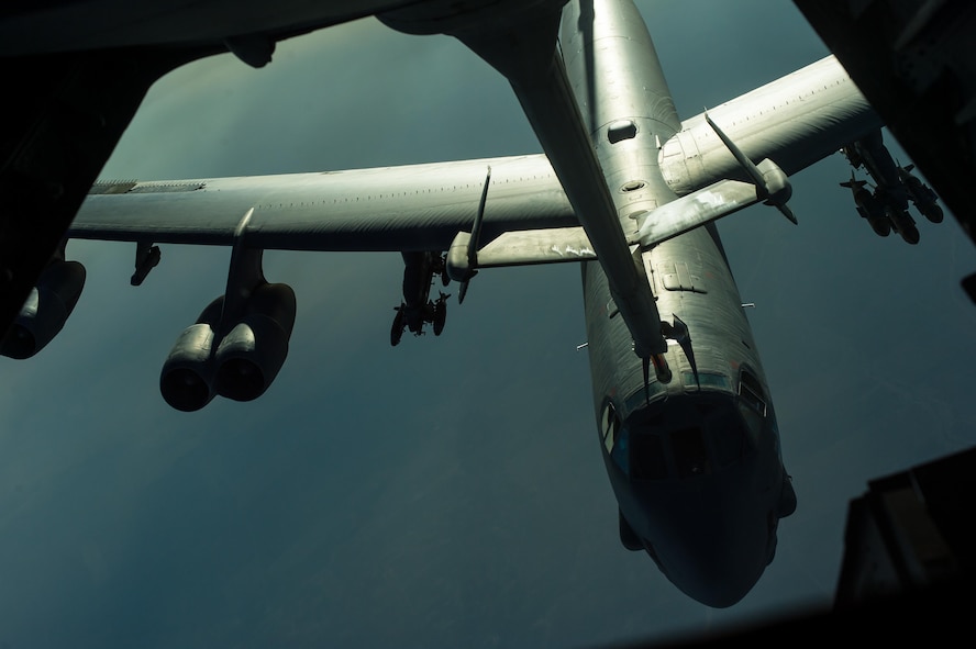 A U.S. Air Force B-52 Stratofortress receives fuel from a U.S. Air Force KC-10 Extender at an undisclosed location near Iraq, Oct. 26, 2016. The B-52 approximately carries 70,000 pounds of armament in the support of the liberation of Mosul, Iraq. (U.S. Air Force photo by Senior Airman Tyler Woodward)