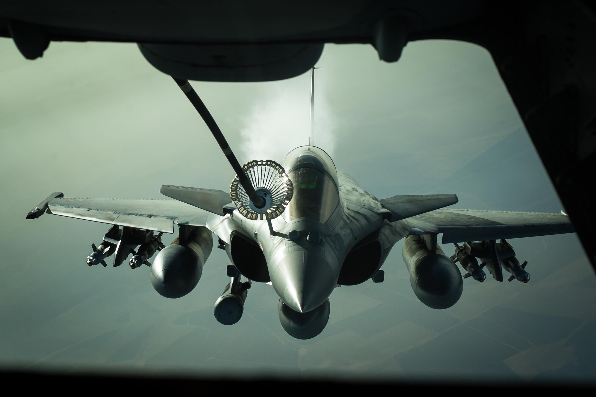 A French air force Dassault Rafale receives fuel from a KC-10 near Iraq, Oct. 26, 2016. The Dassault Rafale is a twin-engine, multi-role fighter equipped with diverse weapons to ensure its success as a omnirole aircraft. The Rafale has flown in combat missions in several countries including Afghanistan, Libya, Syria and now it's supporting the liberation of Mosul in Iraq.  (U.S. Air Force photo by Senior Airman Tyler Woodward)