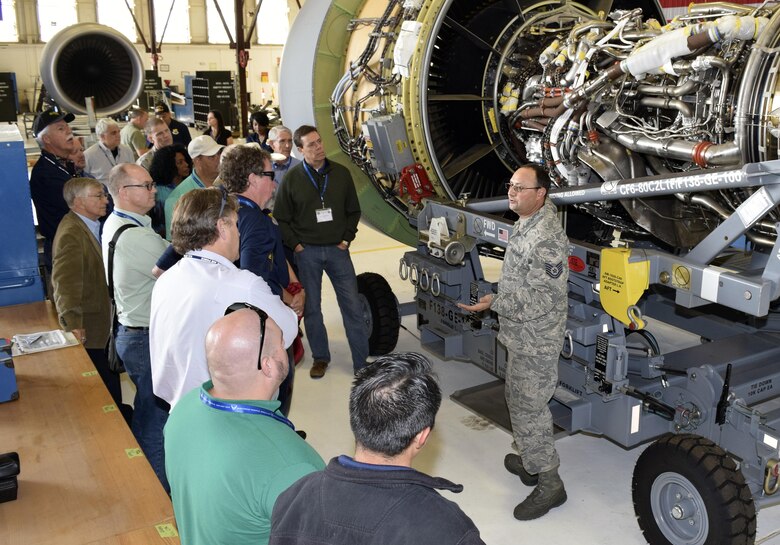 Tech. Sgt. Sean Preston, 433rd Maintenance Squadron engine technician, shows local civic leaders a C-5M Super Galaxy engine in the unit’s engine shop Oct. 27, 2016 while they wait to board a C-5M Super Galaxy bound for Barksdale Air Force Base, Louisiana. later that morning. The group participated in a two-day civic leader tour sponsored by the 433rd Airlift Wing and hosted by the 307th Bomb Wing. (U.S. Air Force photo by Tech. Sgt. Lindsey Maurice)  